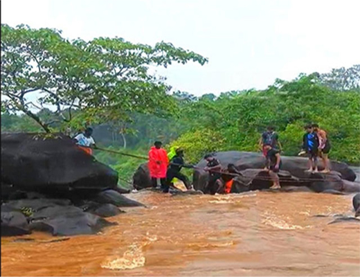 Tourists enjoy Paladka Erugundi falls amid heavy rain; timely rescue by locals averts tragedy